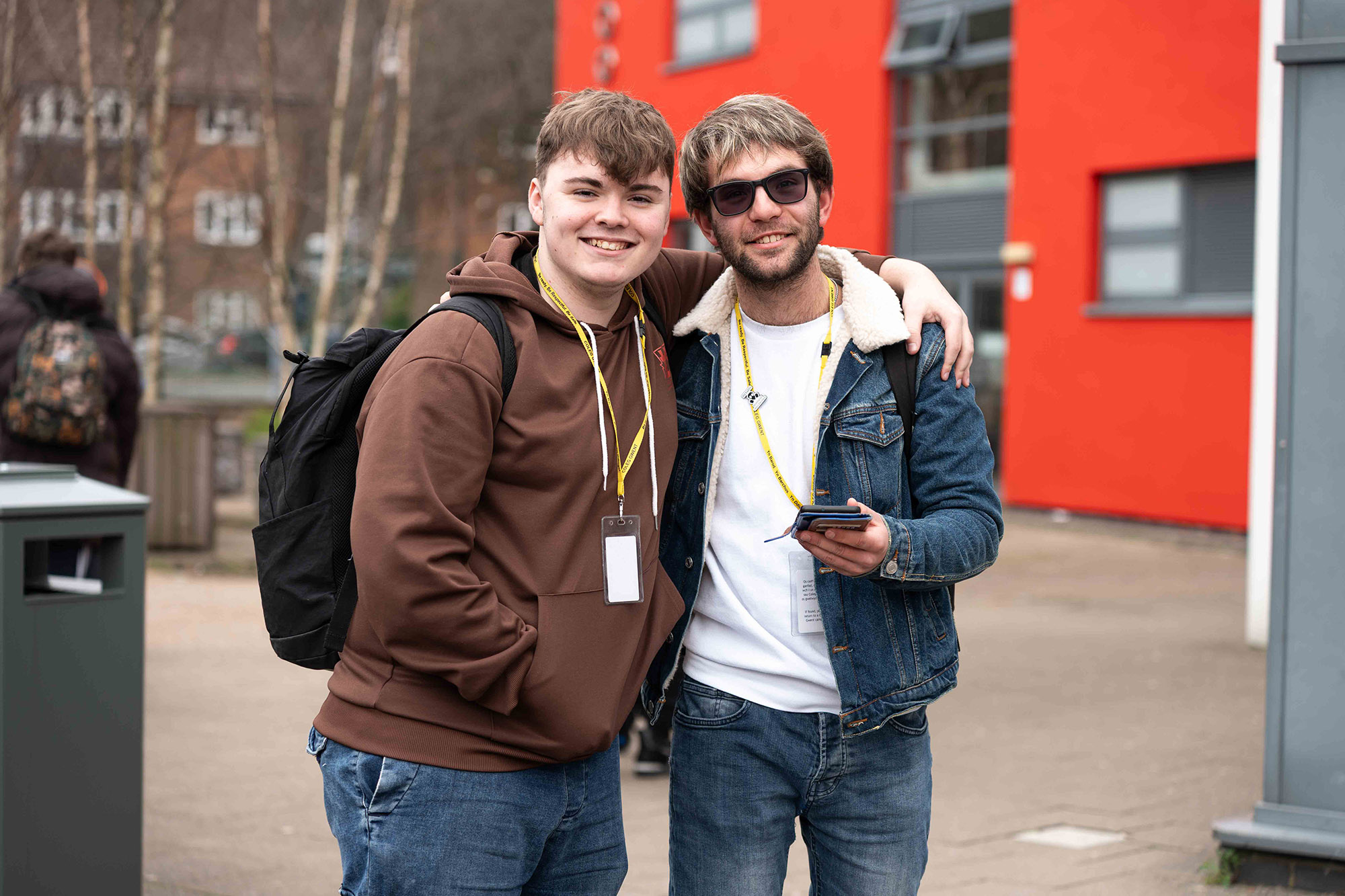 students happy on phone
