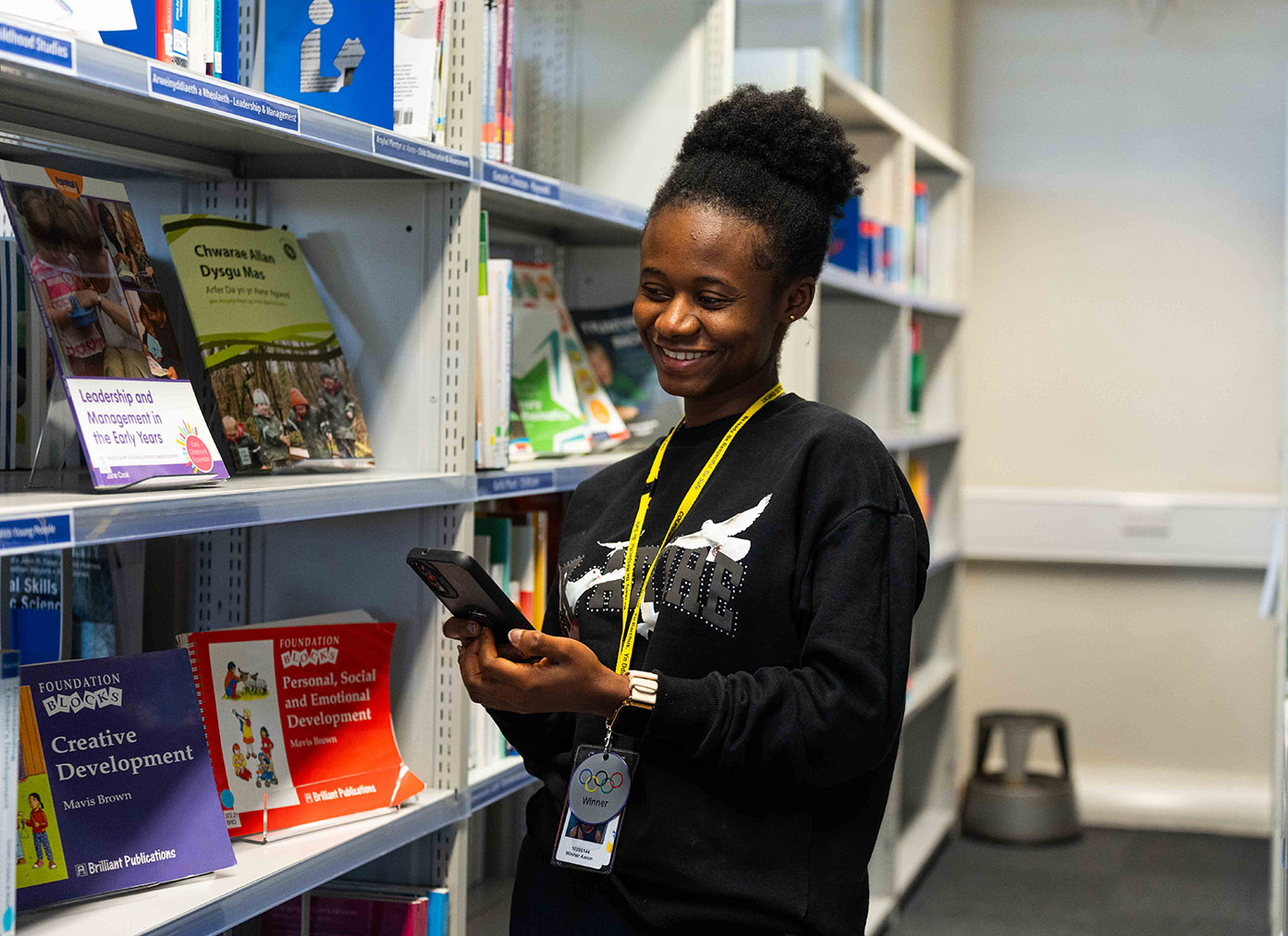 student happy on phone