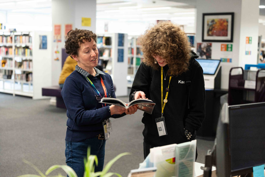 Students at Crosskeys library with staff