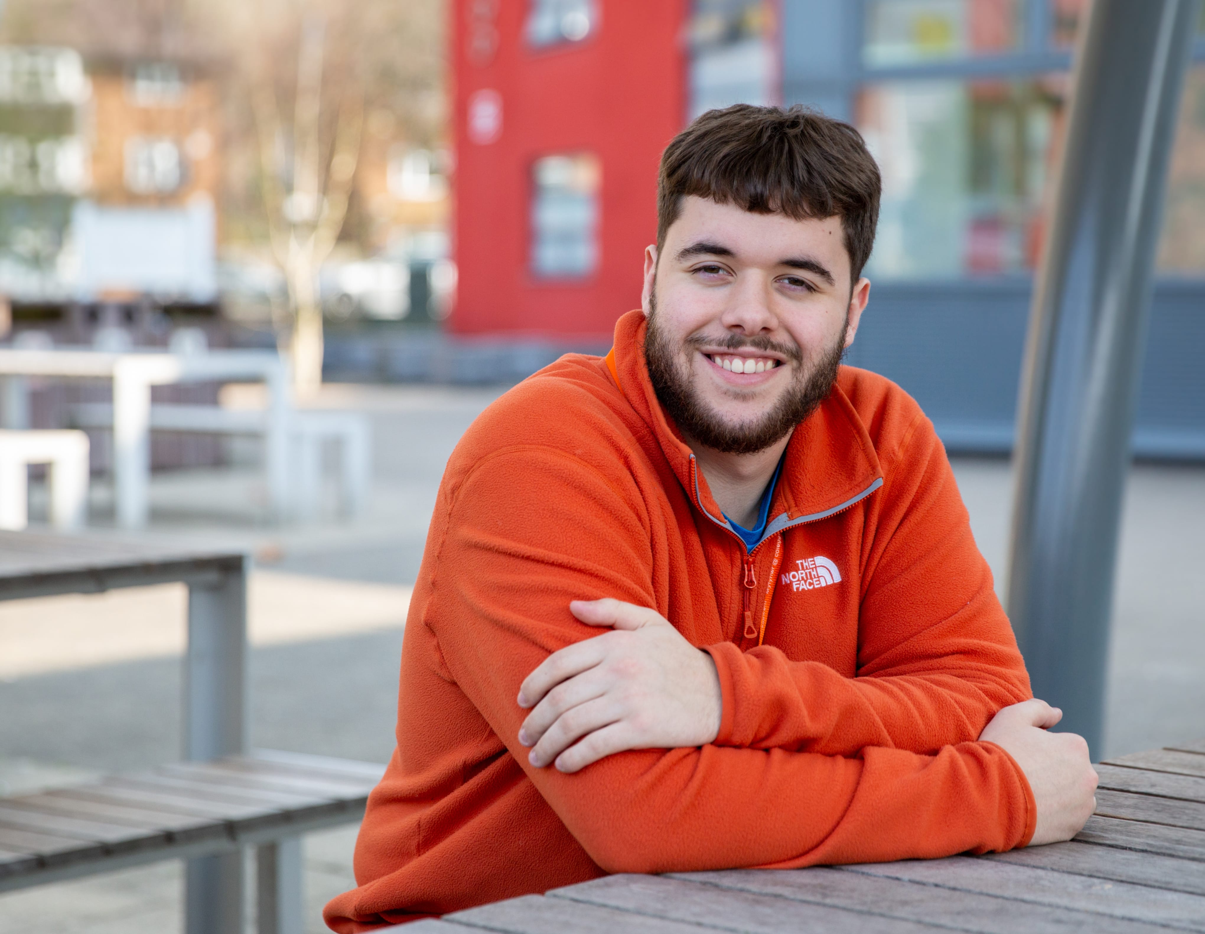 Public Services student with arms folded