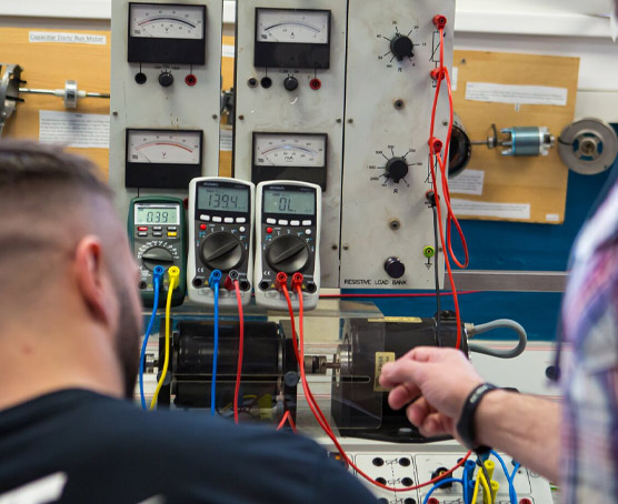 Student in an electrical engineering workshop