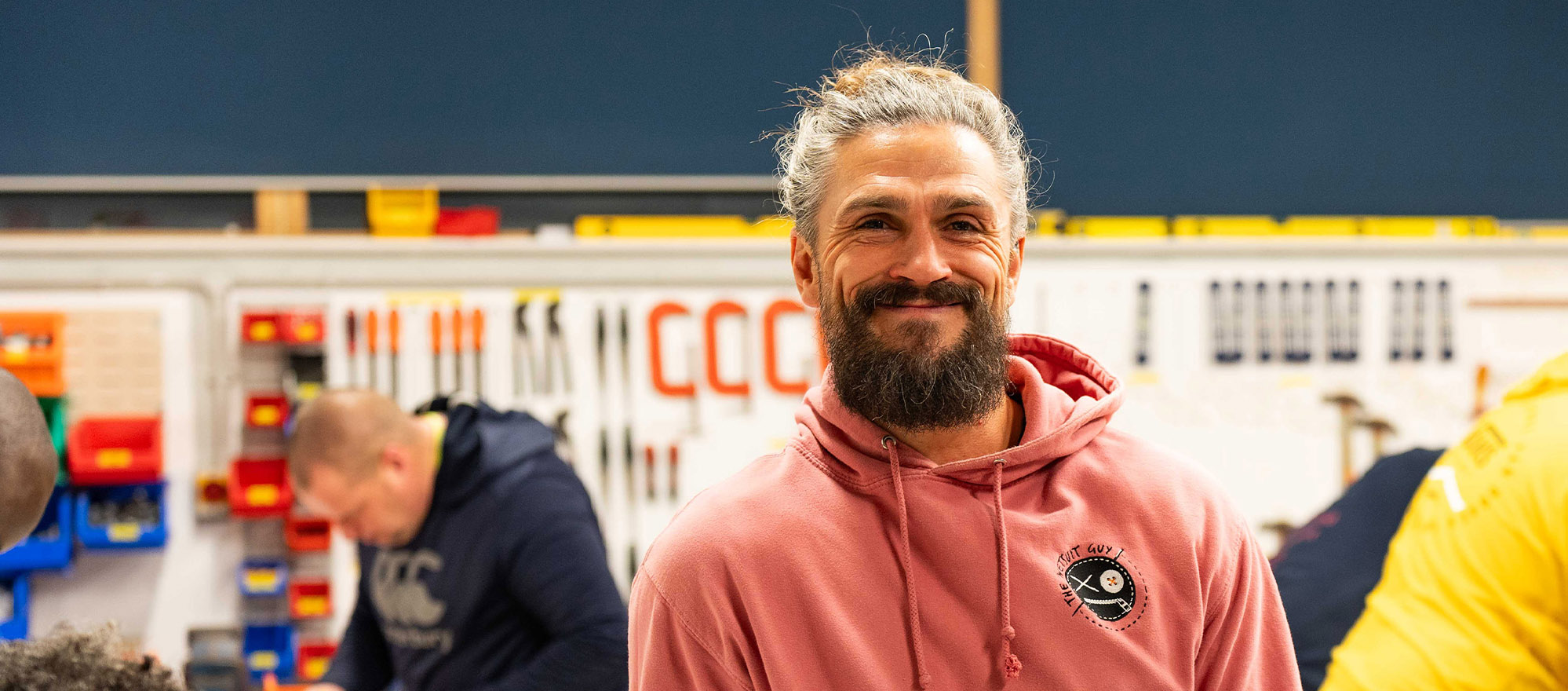 Construction student stood in the workshop