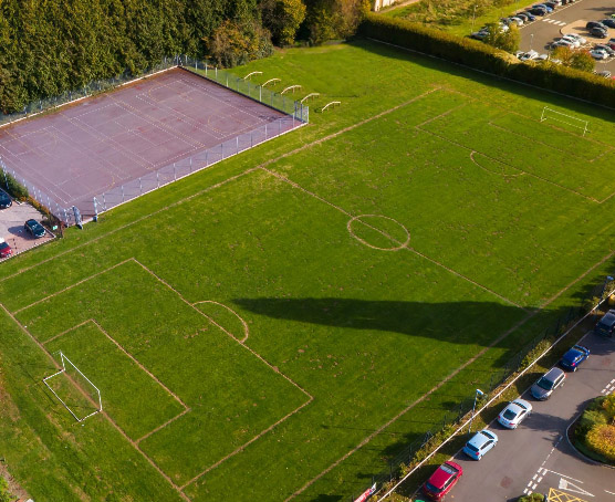 Aerial view of football pitch and tennis courts at Usk