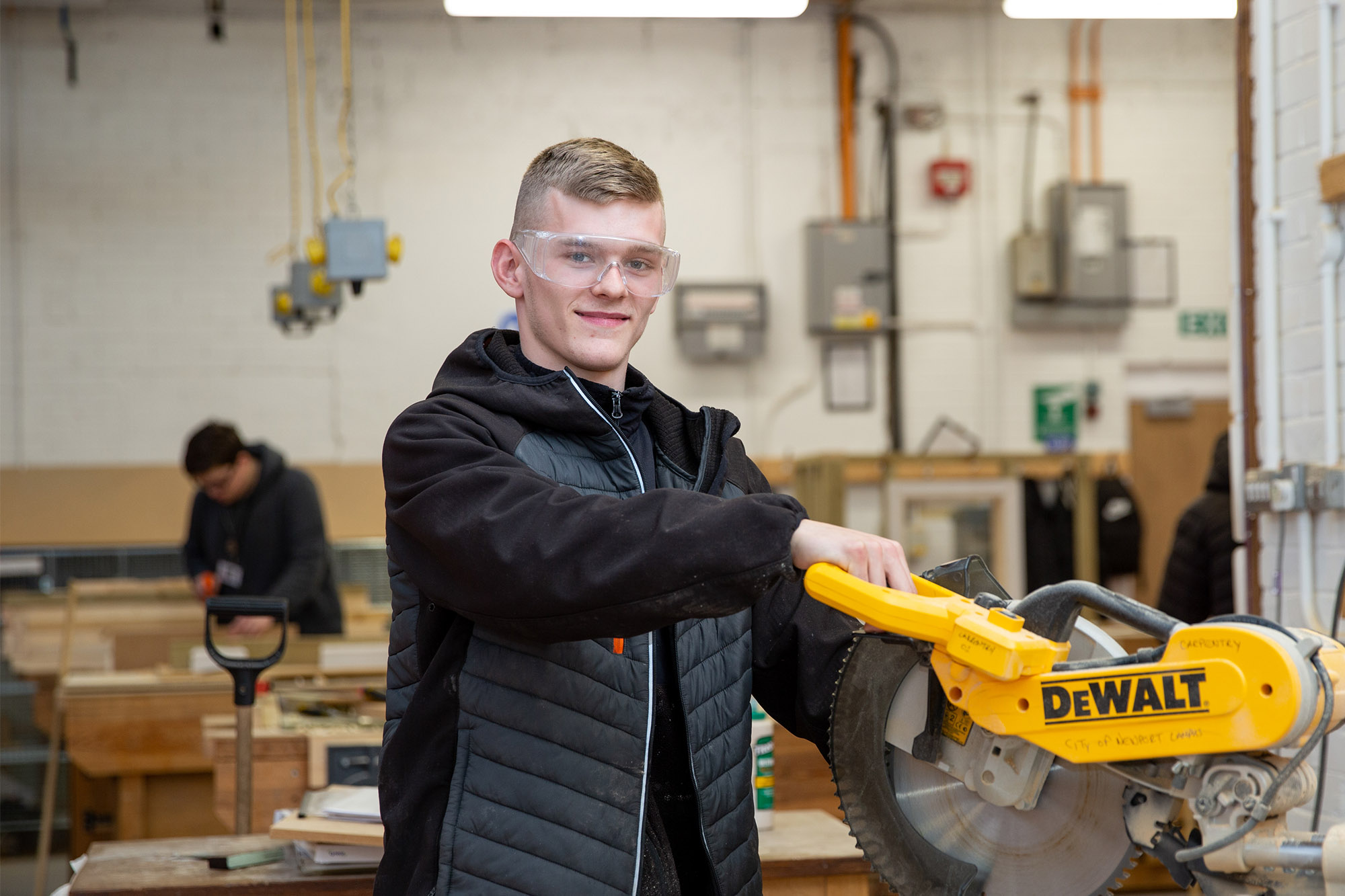 Carpentry student using a circular saw