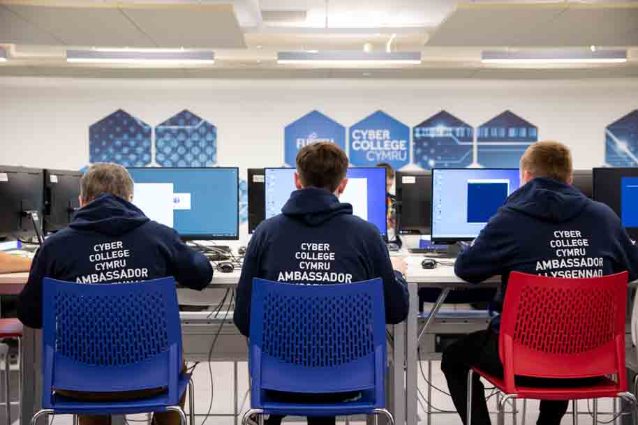 Students working together at Cyber College