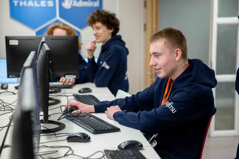 Students working on screens