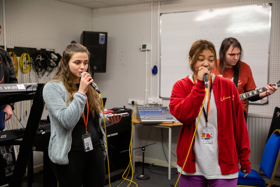 Two students singing