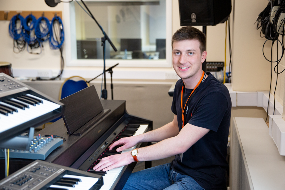 Student playing piano