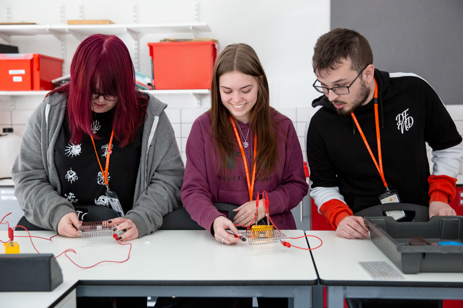 Group of science students working in lab