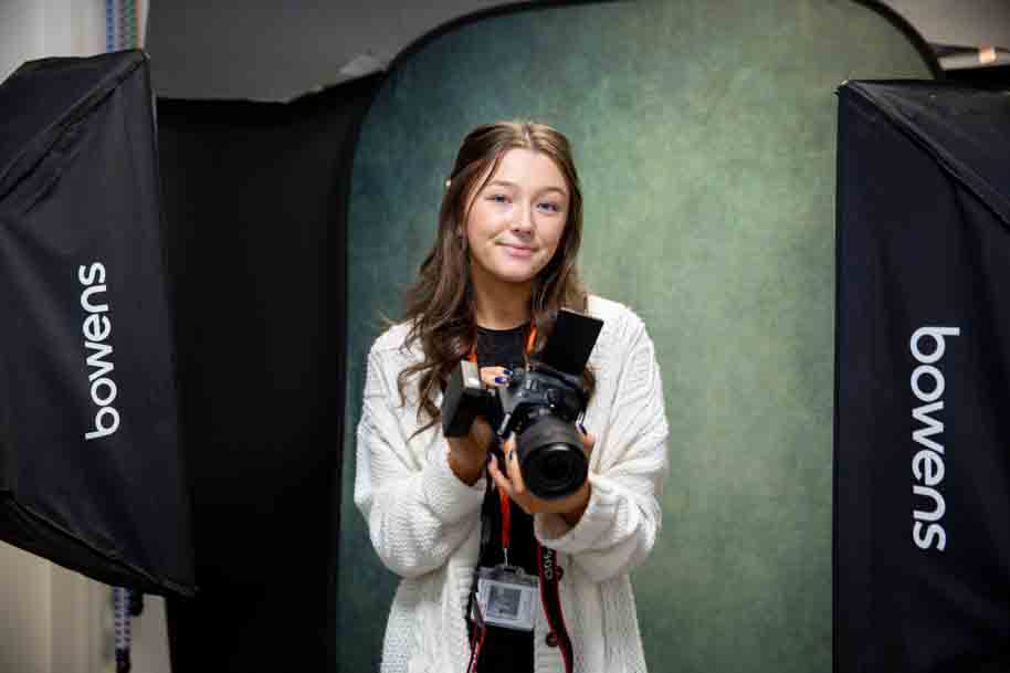 Photography student working in studio