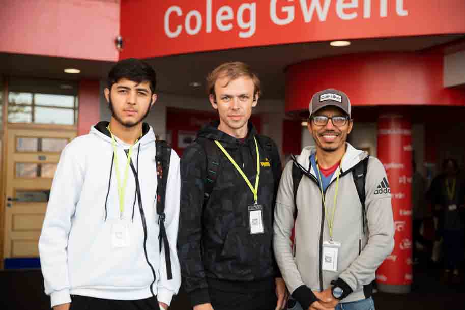 ESOL students at reception smiling