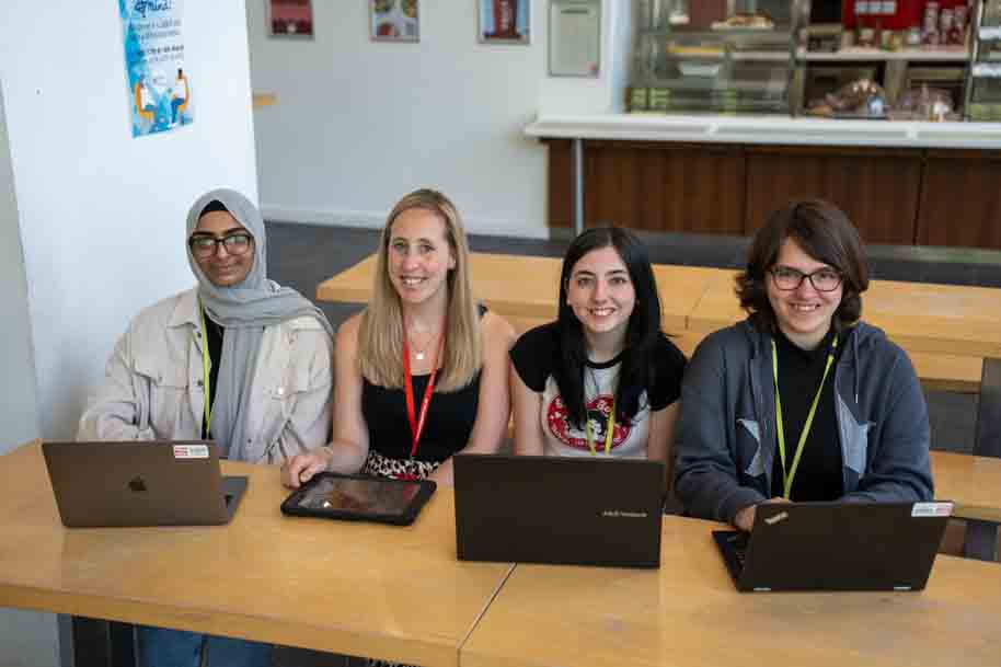 Tutors and students in cafe
