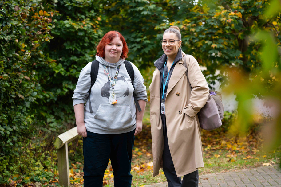 Students smiling at camera