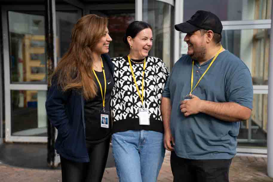 ESOL students smiling outside