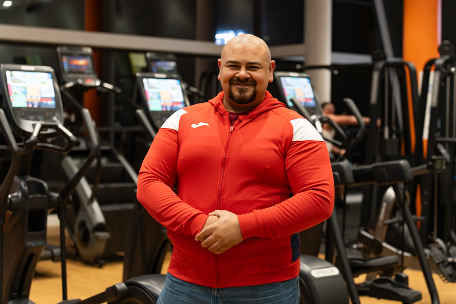 Part time student smiling at gym