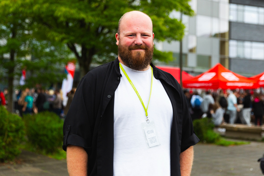 Mature student smiling at Freshers Fair