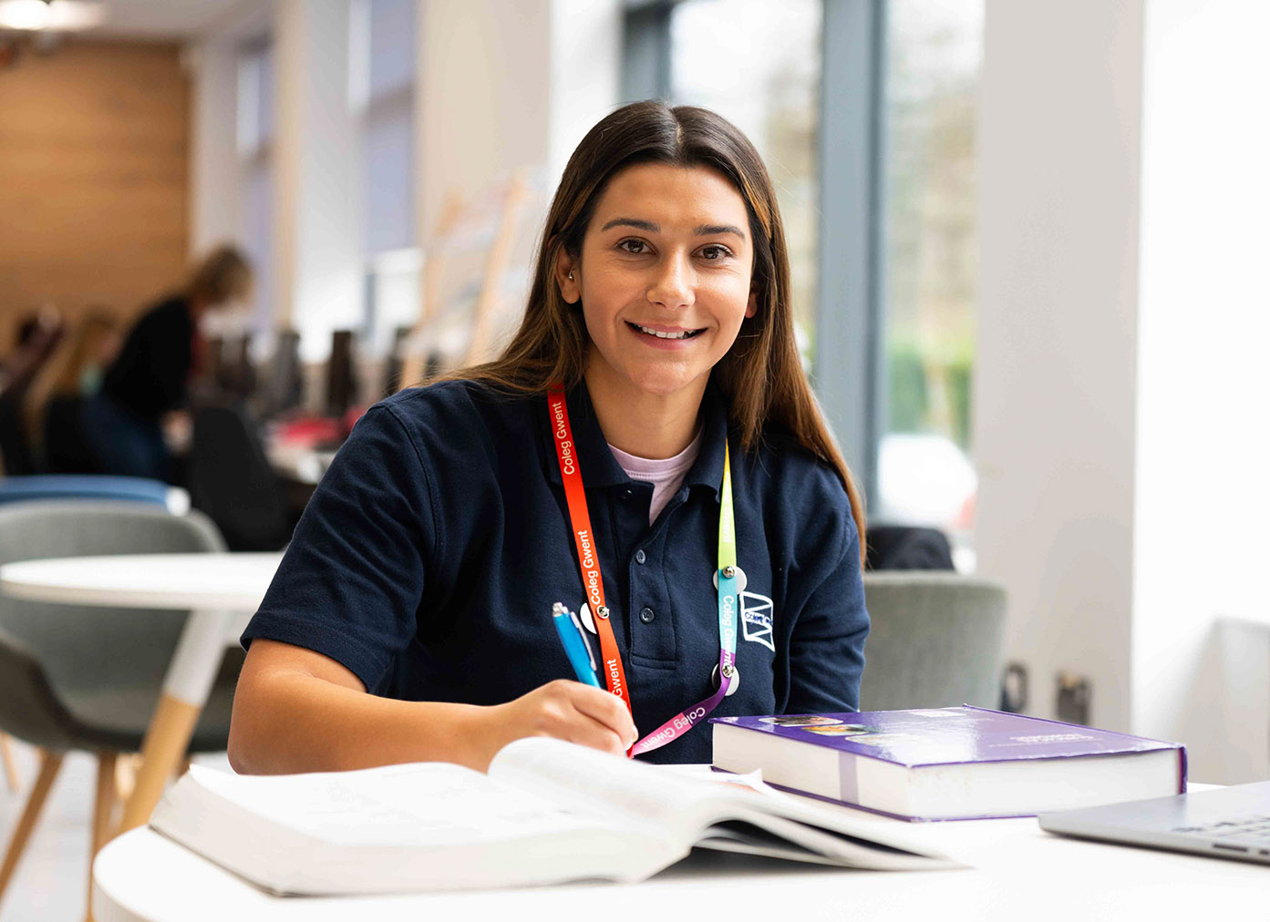 Mature student smiling at screen
