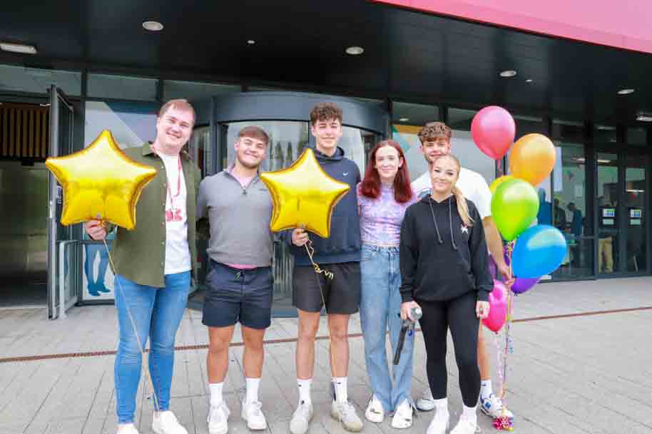 Students smiling on results day