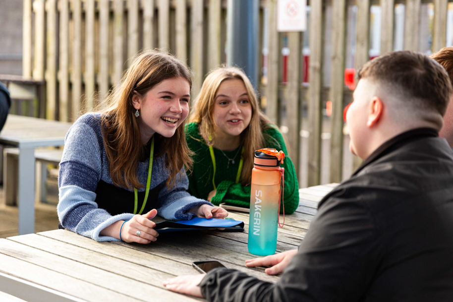 Students on lunch chatting to each other