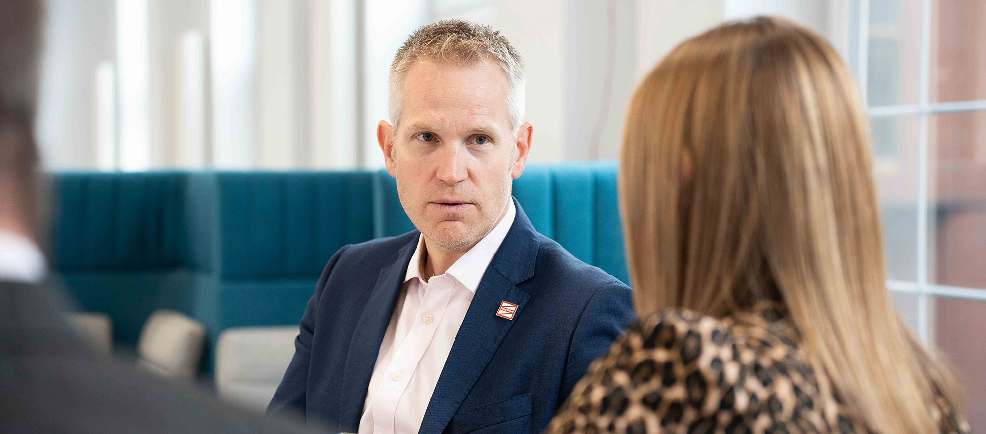 Coleg Gwent staff talking to employer